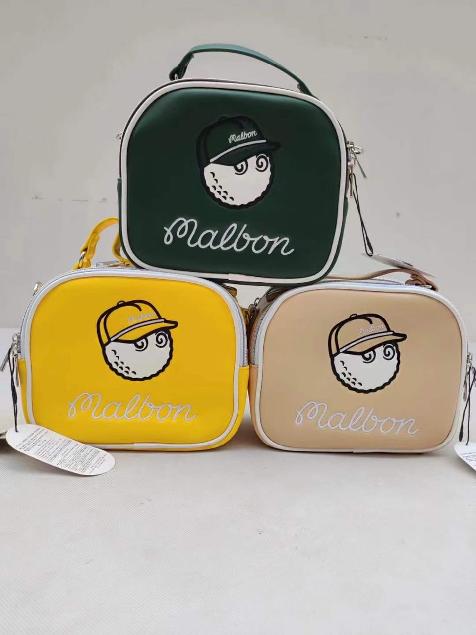 Túi golf cầm tay nữ Malbon